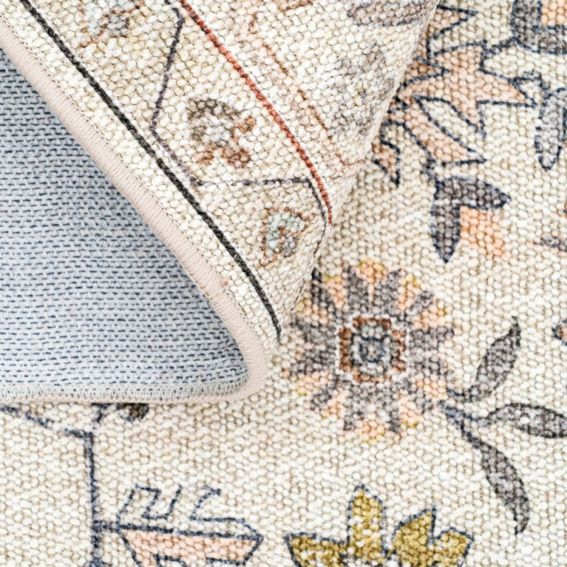 Tapis oriental vintage beige et rose...