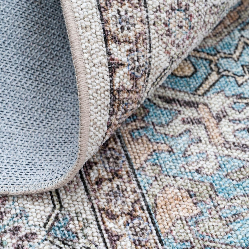 Tapis oriental pastel en polyester...