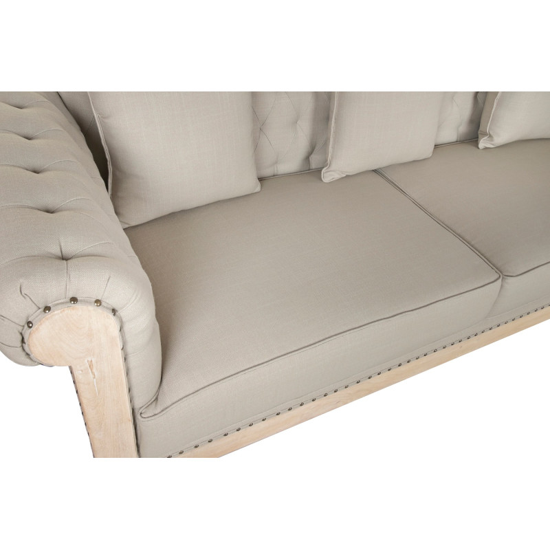 Canapé beige capitonné en bois et...