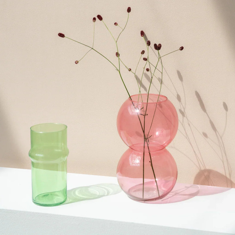 Vase boule rose abricot en verre...