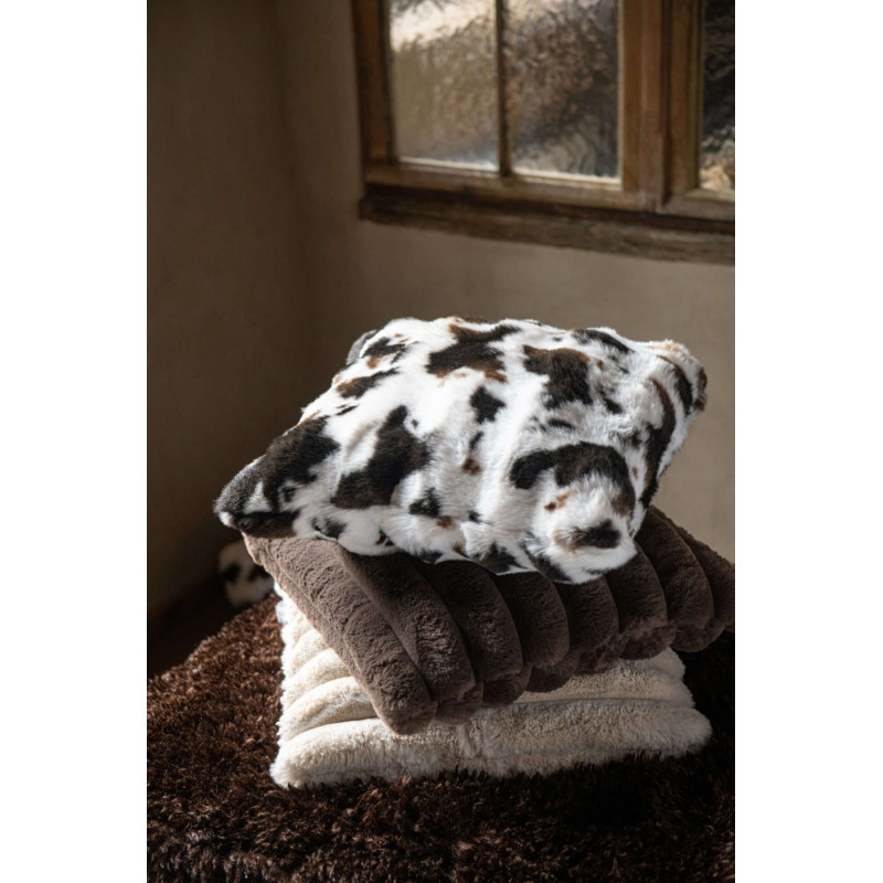 Coussin effet peau de vache marron...