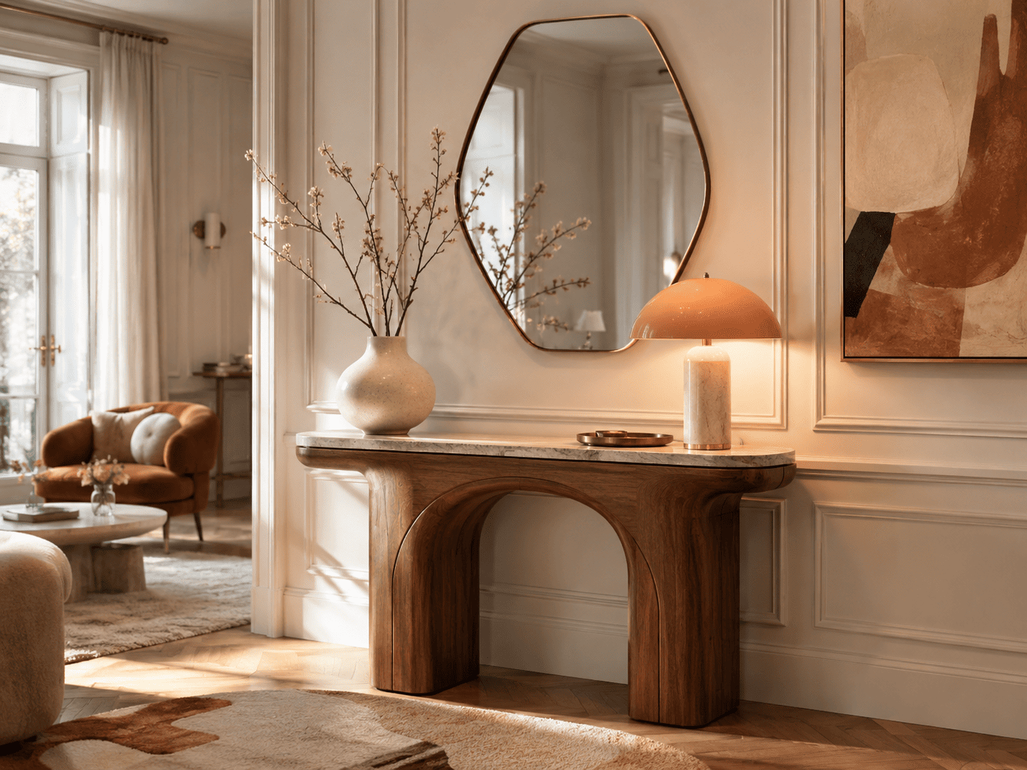 Console design contre un mur décoré avec miroir et lampe pour donner une intention à une entrée